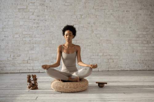 Black woman in yoga pose